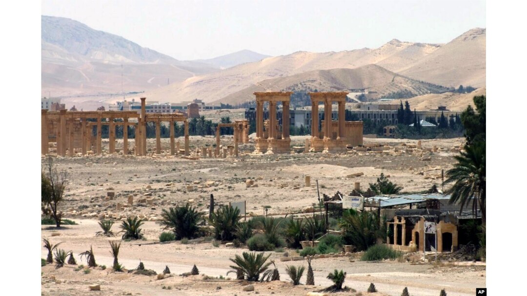 FILE - This file photo released May 17, 2015, by the Syrian official news agency SANA, shows the general view of the ancient Roman city of Palmyra, northeast of Damascus, Syria.