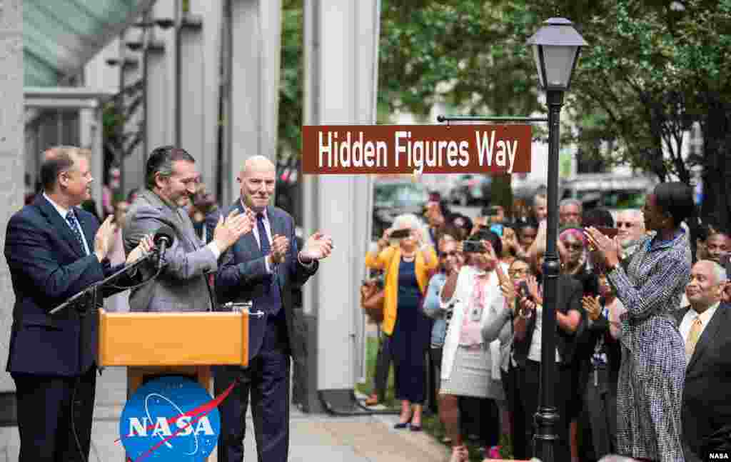 NASA Administrator Jim Bridenstine, U.S. Senator Ted Cruz, R-Texas, D.C. Council Chairman Phil Mendelson, and Margot Lee Shetterly, author of the book "Hidden Figures," unveil the "Hidden Figures Way" street sign at a dedication ceremony, at NASA Headquarters in Washington, D.C.