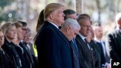 Rais wa Marekani Donald Trump na makamu wake Mike Pence wakati wa mazishi ya mwinjilisti maarufu Billy Graham mjini Charlotte, N.C., March 2, 2018.