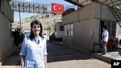 Nikki Haley, the U.S. Ambassador to the U.N., poses for a photo during a visit at the Reyhanli border crossing with Syria, near Hatay, southern Turkey, May 24, 2017.
