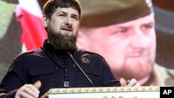 FILE - Chechen regional leader Ramzan Kadyrov speaks at celebrations marking Defenders of the Fatherland Day in Chechnya's provincial capital Grozny, Russia, Feb. 20, 2016.