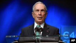 FILE - Former New York Mayor Michael Bloomberg speaks during the C40 cities awards ceremony, in Paris, Dec. 3, 2015.