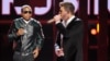 Pharrell Williams, left, and Robin Thicke perform onstage at the BET Awards at the Nokia Theater, June 30, 2013, in Los Angeles. 