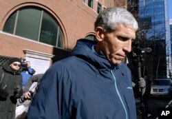William "Rick" Singer founder of the Edge College & Career Network, departs federal court in Boston on March 12, 2019, after he pleaded guilty to charges in a nationwide college admissions bribery scandal.