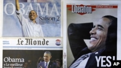 The front pages of special editions of French daily newspapers Le Figaro, Le Monde and Liberation published in Paris, Wednesday Nov. 7, 2012, following the re-election of U.S. President Barack Obama.