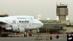 FILE - A Boeing 747 of Iran's national airline at Mehrabad International airport in Tehran.