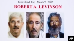  FILE- An FBI poster showing a composite image of former FBI agent Robert Levinson (right) of how he would look like now after five years in captivity, and an image (center) taken from the video, released by his kidnappers, and a picture before he was kid