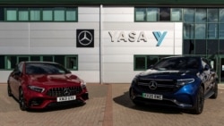 Two electric cars are parked at YASA headquarters and production facility in Oxford, Britain, August 24, 2021. Picture taken August 24, 2021. REUTERS/May James