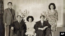 Armenian "Titanic" survivor Neshan Krekorian (seated left) with his wife, Persape (seated right), daughter Angie (center), son George (left), and daughter Alice (right).