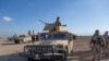 در پایگاه هوایی عین الاسد نیروهای آمریکایی و عراقی حضور دارند. 