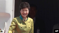 South Korean President Park Geun-hye greets well-wishers as she leaves for the United States, at the Seoul Military Airport in Seongnam, May 5, 2013.