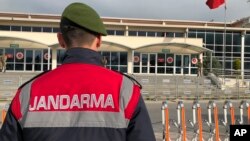 Turkish soldiers stand outside the court in a prison complex where the trial against former pro-Kurdish party co-chairman Selahattin Demirtas and legislator Sirri Sureyya Onder continues, in Silivri, outside Istanbul, April 30, 2018.