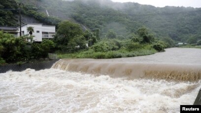 Mực nước sông Futami dâng cao do mưa lớn ở Yatsushiro, tỉnh Kumamoto, miền nam Nhật Bản, 3/7/2019