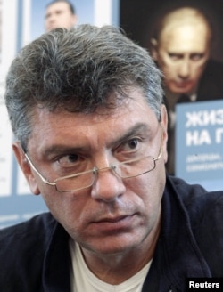 Russian opposition leader Boris Nemtsov attends a news conference to present the report "The Life of a Galley Slave" in Moscow, August 28, 2012.