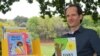 Steve Tsakaris presents one of Read to Rise's unique mini-libraries. (D. Taylor/VOA)