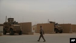 FILE - U.S. Marines are stationed in al-Asad air base in Anbar, Iraq, Nov. 8, 2017.