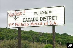 Opposition parties and Port Elizabeth residents say service delivery in the Eastern Cape has deteriorated dramatically under the ANC. This photograph shows a defaced road sign in the province, with vandals registering protest against poor roads in Cacadu