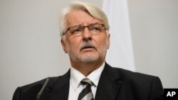 Poland's Foreign Minister, Witold Waszczykowski, addresses members of the media during a joint UK/Poland press conference in the Foreign and Commonwealth Office, Oct. 12, 2017 in London. 