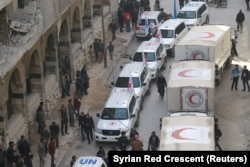 Trucks from Syrian Red Crescent and humanitarian partners are seen in Ghouta, Syria, March 5, 2018, in this picture obtained from social media.