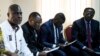 Martin Fayulu (1e G) et Théodore Ngoy (1er D) lors d'une réunion des candidats avant la présidentielle du 30 décembre 2018 à Kinshasa, 25 décembre 2018.