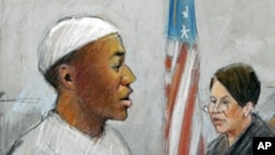 In a courtroom sketch, Umar Farouk Abdulmutallab is sentenced to life in prison by U.S. District Judge Nancy Edmonds in federal court in Detroit, Feb. 16, 2012.