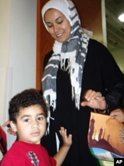 Sally Hassan with one of her children at the ADAMS center, 13 Sep 2010