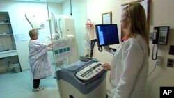 Woman taking mammogram test