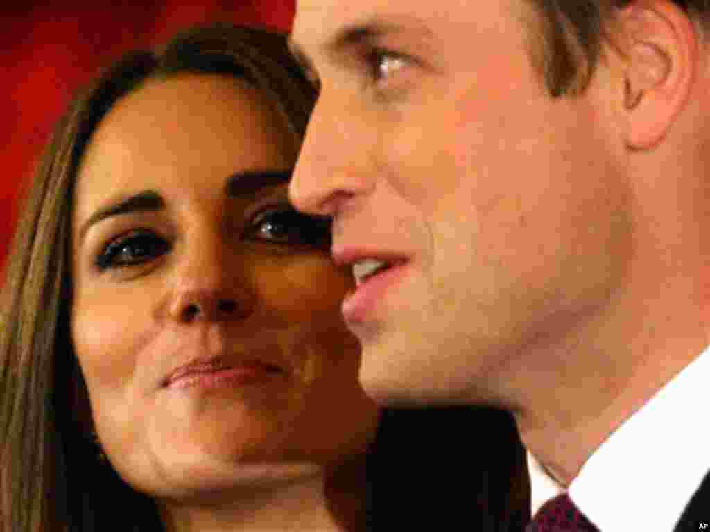 Nov 16: Britain's Prince William and his fiancee Kate Middleton pose for the media at St. James's Palace in London after announcing their marriage. The couple are to wed in 2011.(AP Photo/Sang Tan)