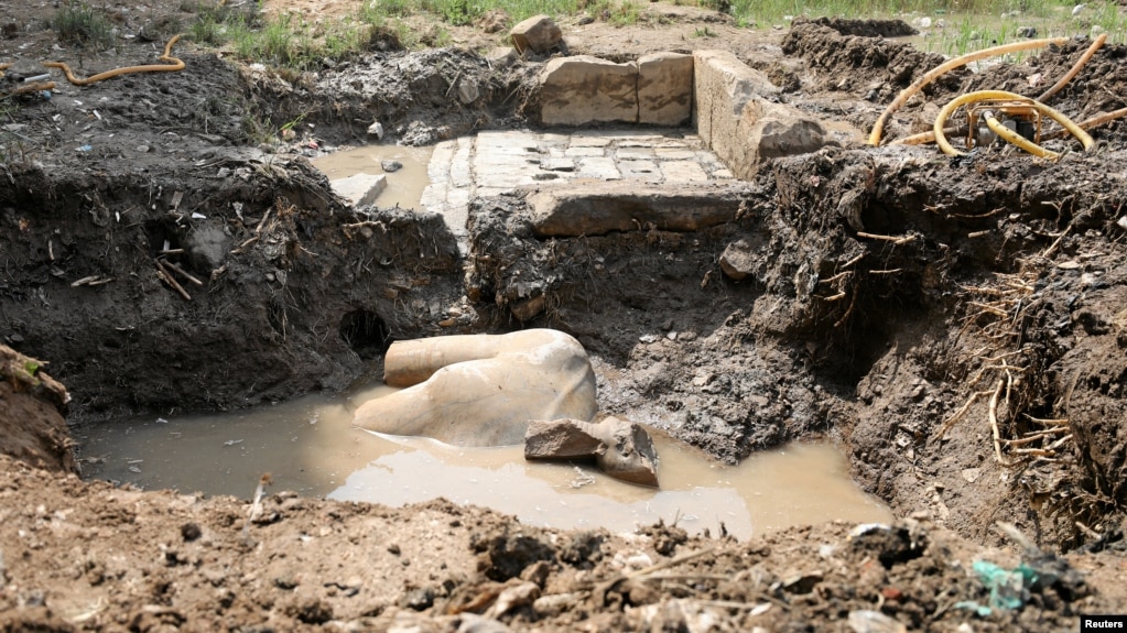 A statue workers say depicts Pharaoh Ramses II who ruled Egypt over 3,000 years ago was unearthed on Thursday in the Matariya area in Cairo, Egypt, March 9, 2017.