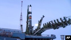 In this file photo distributed by Roscosmos Space Agency Press Service, Feb. 11, 2018, Russian cargo ship Soyuz 2,1A is seen on the launch pad at Russia's main space facility in Baikonur, Kazakhstan.