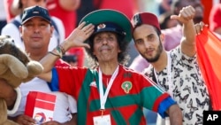 Des supporters marocains lors de la CAN 2019 au caire, Egypte, le 23 juin 2019. (AP Photo/Ariel Schalit)