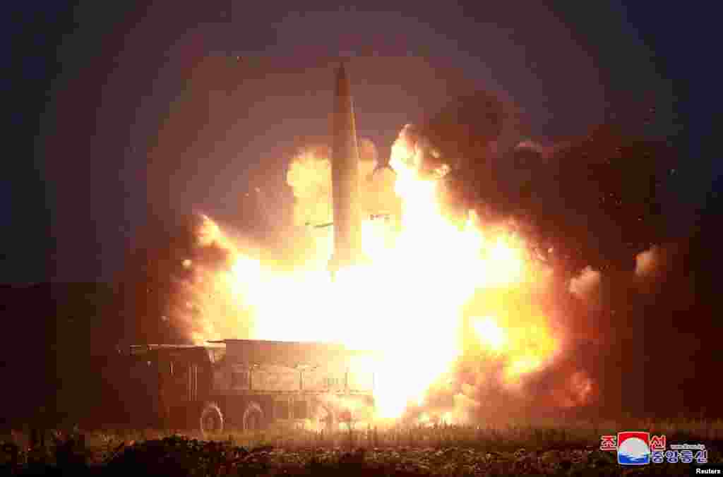 A missile is launched during testing at an unidentified location in North Korea, in this undated image provided by KCNA.