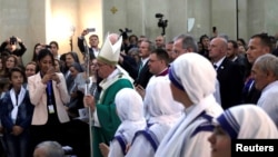 Pope Francis arrives to lead a mass at the Immaculate Conception church in Baku, Azerbaijan, Oct. 2, 2016. 