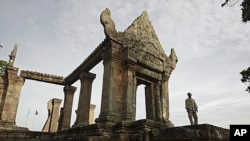 FILE - A Cambodian temple security guard stands at Preah Vihear temple, Cambodia.