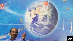 FILE - Indian Space Research Organization (ISRO) Chairman Kailasavadivoo Sivan gestures during a press conference at their headquarters in Bangalore, India, Jan. 11, 2019. 