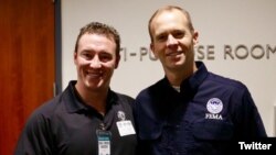 Carl Higbie (left) and FEMA Administrator Brock Long pose together after an October 2017 meeting to discuss wildfires in California.