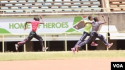 Nairobi's Moi International Sports Center is undergoing renovation in preparation for the championships. Above the din, athletes perfect their skills. (L. Ruvaga/VOA)