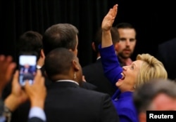 FILE - U.S. Democratic presidential candidate Hillary Clinton waves to supporters in the crowd during a campaign stop in Long Beach, California, June 6, 2016.