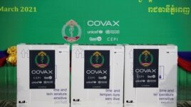 In this file photo, Containers of Oxford/AstraZeneca vaccines are pictured during a handover ceremony as the country receives its coronavirus disease (COVID-19) vaccines under COVAX scheme at the Phnom Penh International Airport, Cambodia, March 2, 2021. REUTERS