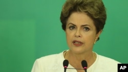 Brazil's President Dilma Rousseff speaks during a press conference after impeachment proceedings were opened against her by the President of Chamber of Deputies Eduardo Cunha.
