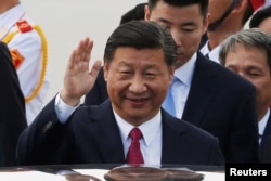 FILE - China's President Xi Jinping arrives for the APEC Summit in Danang, Vietnam, Nov. 10, 2017. REUTERS