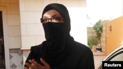 A female Saudi motorist speaks to the media after driving her vehicle in defiance of the ban on driving in Riyadh June 22, 2011. 
