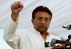 FILE - Pakistan's former President and military ruler Pervez Musharraf addresses his party supporters at his house in Islamabad, April 15, 2013.