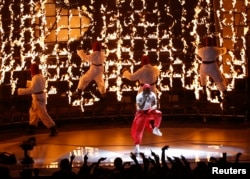 FILE - Kendrick Lamar performs at the MTV Video Music Awards, Inglewood, California, Aug. 27, 2017.