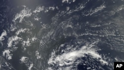 Scientists watch ocean storms using NASA satellites.