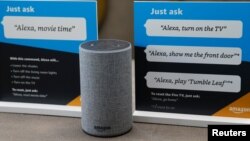 FILE - Prompts on how to use Amazon's Alexa personal assistant are seen in an Amazon "experience center" in Vallejo, Calif., May 8, 2018. The device and many other services were impacted by the company's cloud services outage on June 13, 2023.