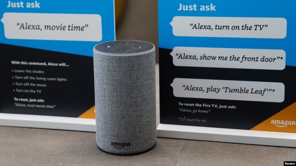 FILE - Prompts on how to use Amazon's Alexa are seen in an Amazon "experience center" in Vallejo, California, May 8, 2018. In an effort to counter possible sexist stereotypes, a team created a voice nicknamed Q that is designed to be perceived as neither male or female.