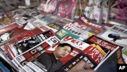 One of the magazines at a newspaper stand in Beijing highlights North Korea's new leader Kim Jong Un, December 30, 2011.
