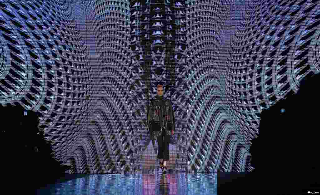 A model displays a creation of Etro Autumn/Winter 2013 collection at Milan Fashion Week in Milan, Italy.