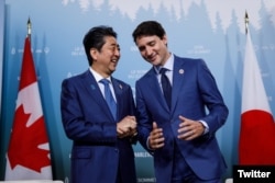 El primer ministro de Japón Shinzo Abe y el primer ministro de Canadá, Justin Trudeau, en la Cumbre del G7 en Canadá. Junio 8 de 2018. Foto: @CanadianPM.
